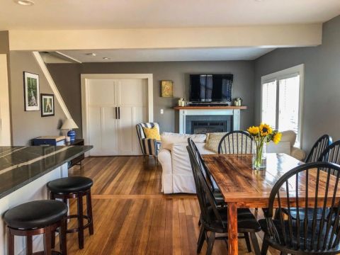 Breakfast bar on your left, dining area on your right, living room straight ahead. 