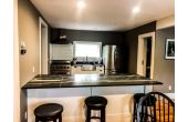 Kitchen with breakfast bar 
