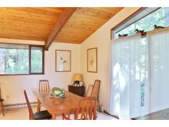 Dining area with sliding glass doors to the deck 
