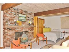 Lower level living room with fireplace 