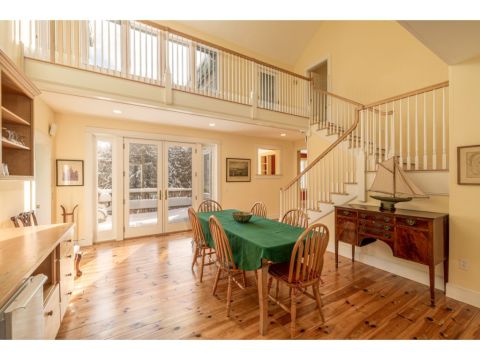 Dining room opens onto a lovely deck for outdoor living