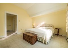 Second floor bedroom suite with abundant closet space, and a private bath with a tub/shower
