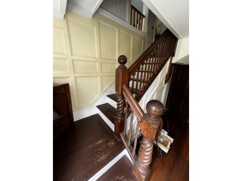 Stairs from livng room to the second floor 