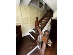 Stairs from livng room to the second floor 